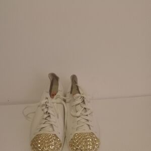 Shoes(white with some gold on it)(size 10)(never been worn)(brand Georgie shoes)
